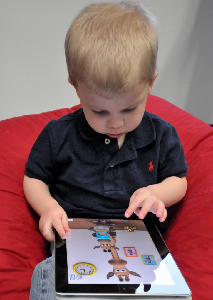 Child with iPad - WikimediaCommons
