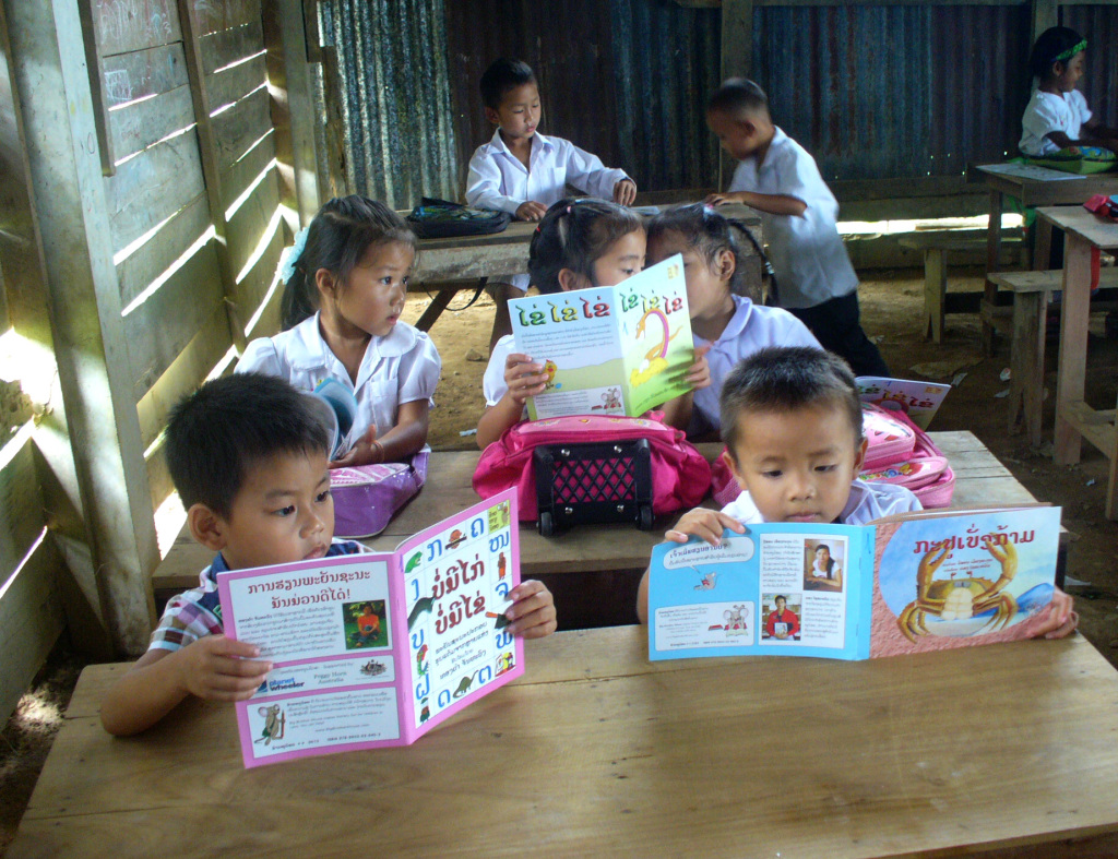 Primary-School-Students-Reading-in-Laos-Wikimedia-1024x787